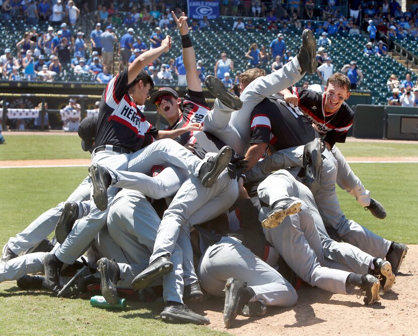 Colleyville Heritage players celebrate their 14-2 victory in 6 innings over Georgetown to...