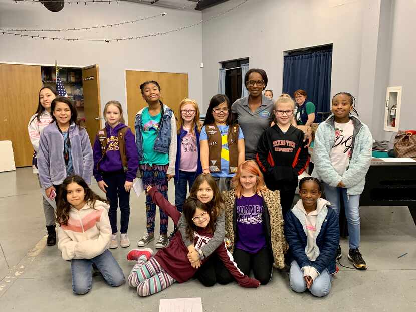 This Grand Prairie Girl Scouts troop invited a school counselor to talk with them about...