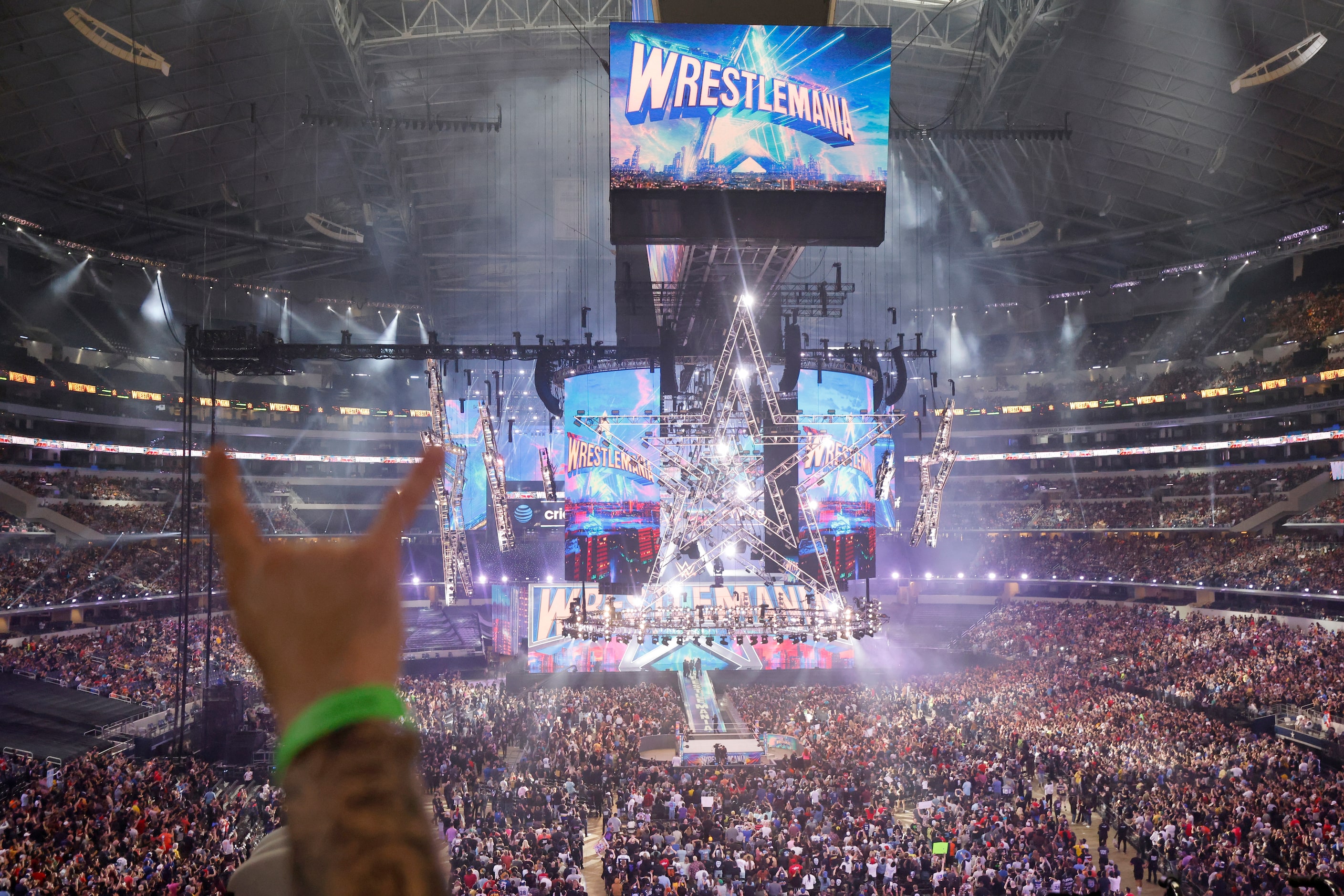 Fans cheer at the start of WrestleMania in Arlington, Texas on Saturday, April 2, 2022. 