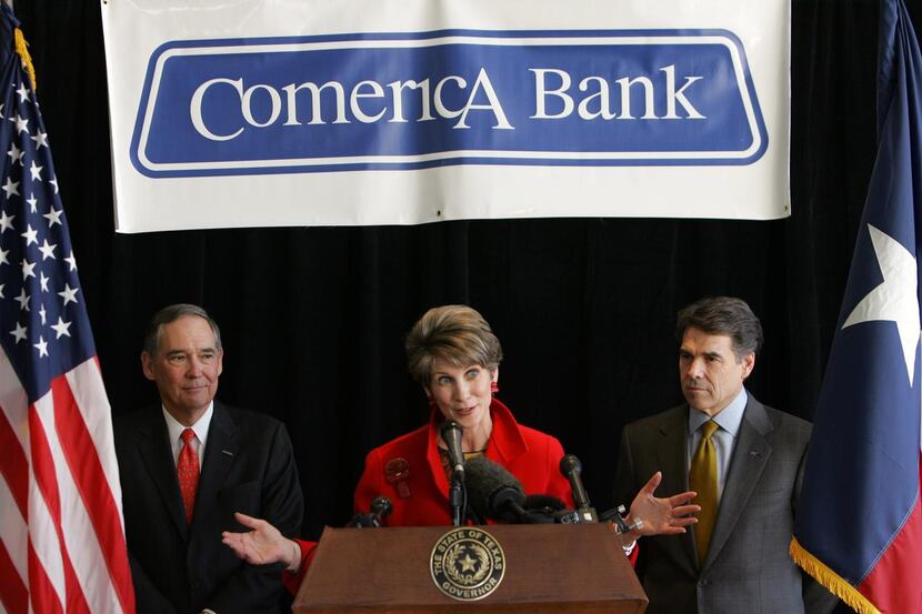 
Former Dallas Mayor Laura Miller, center, speaks during a 2007 press conference announcing...