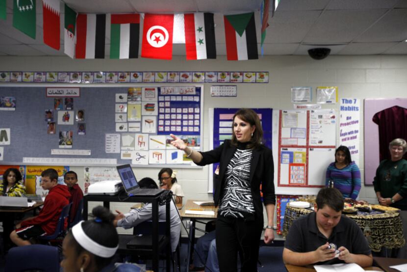 Arabic teacher Tamara Haddad teaches seventh-grade students about Moroccan culture at...