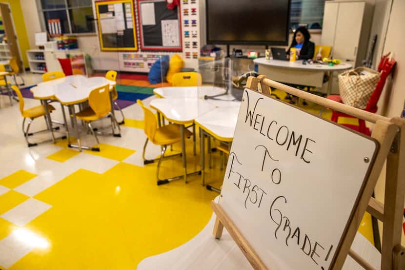 First grade teacher Shontee Brandon sat in an empty classroom as she prepared to teach...