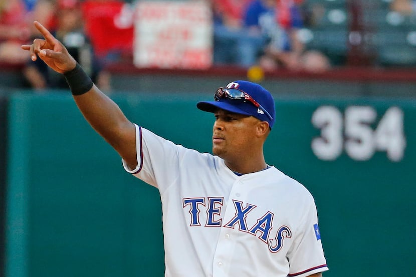 Texas Rangers third baseman Adrian Beltre (29) gestures  in the ninth inning during the...