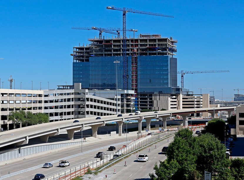 Liberty Mutual's 19-story office towers on the Dallas North Tollway will open later this year.