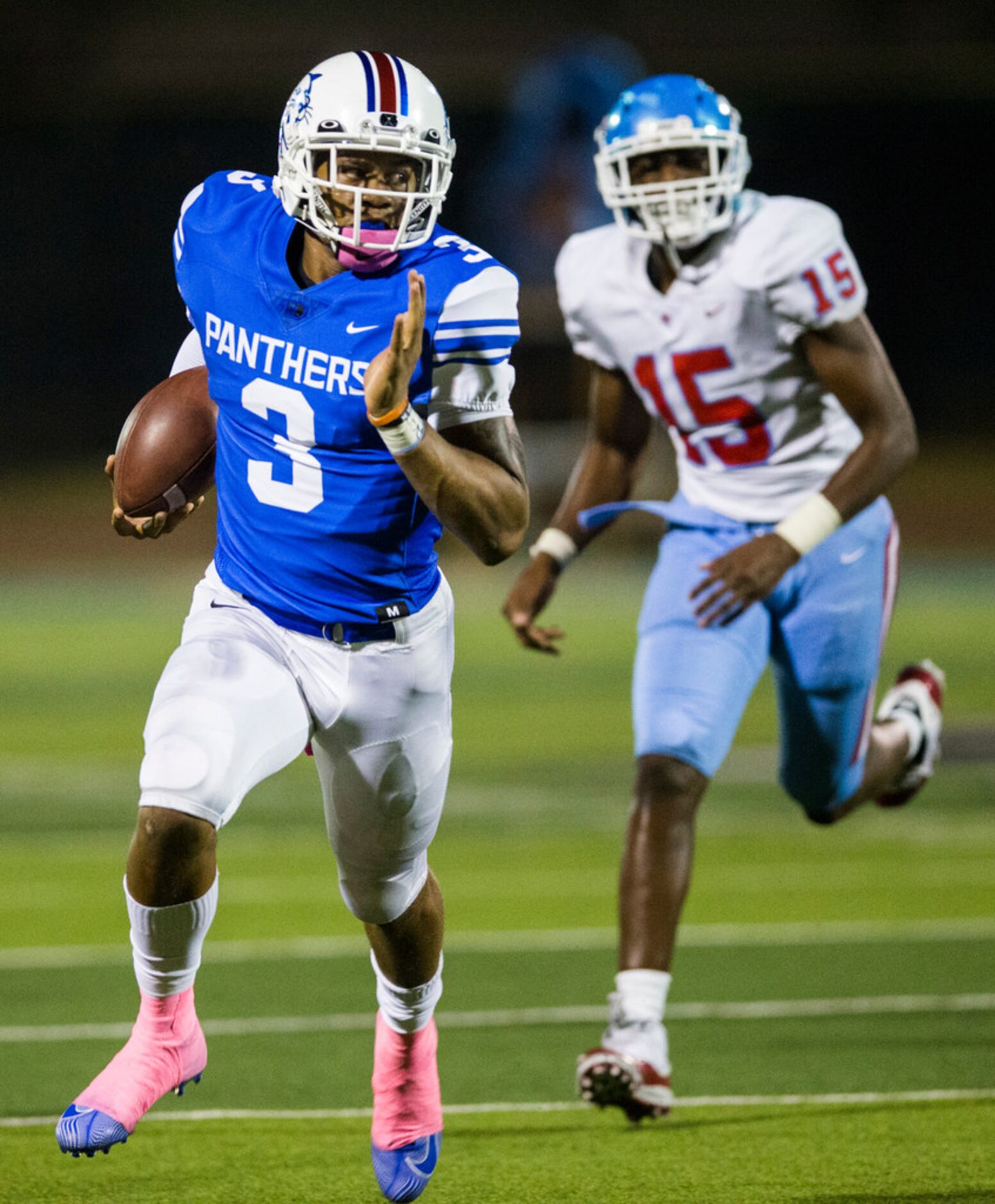 Duncanville quarterback Ja'Quinden Jackson (3) runs the ball against Skyline linebacker...