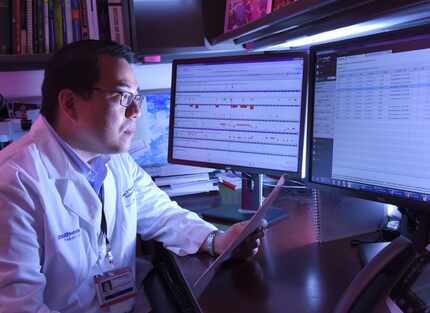 Dr. Jason Park, a UT Southwestern researcher and lead author of the study, examines genetic...