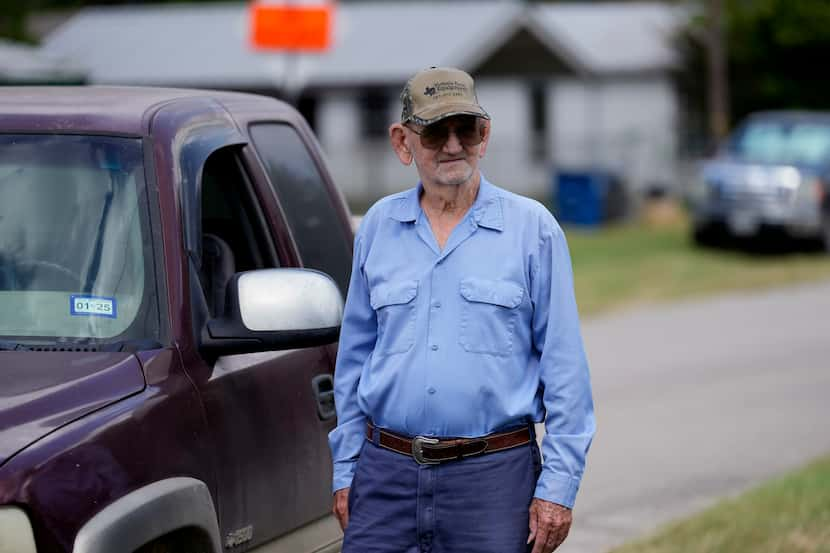 John Riley, 86, watches as workers begin demolition of the First Baptist Church of...