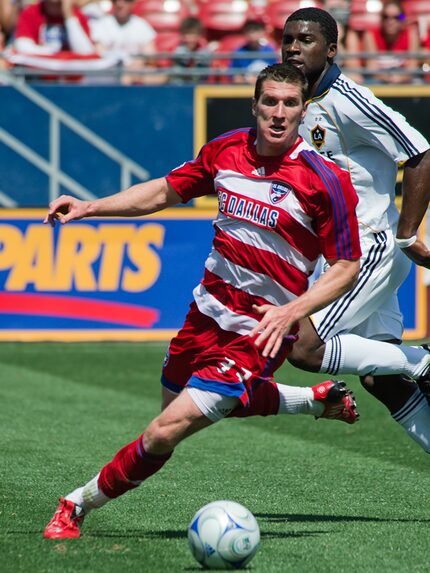 #33 Kenny Cooper of FC Dallas takes on the LA Galaxy.