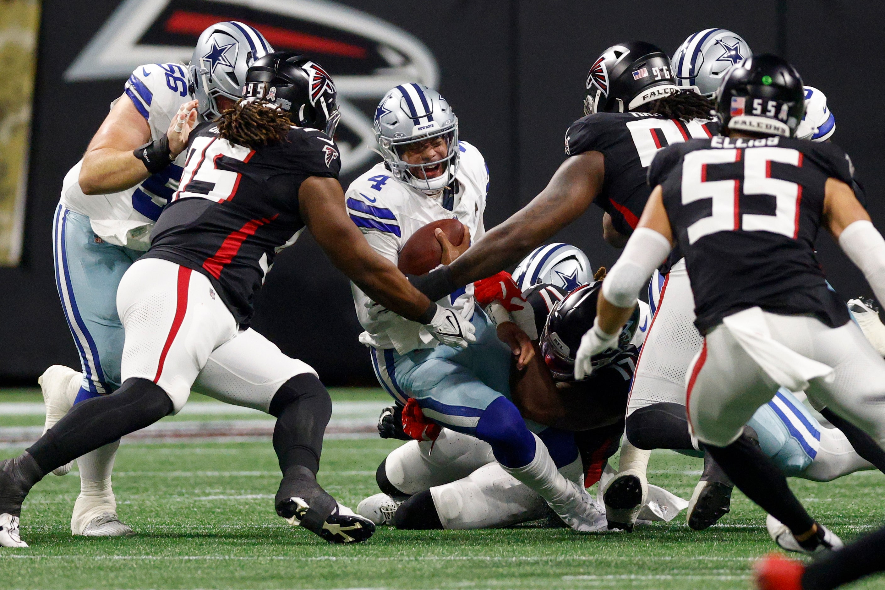 Atlanta Falcons linebacker Arnold Ebiketie (17) sacks Dallas Cowboys quarterback Dak...