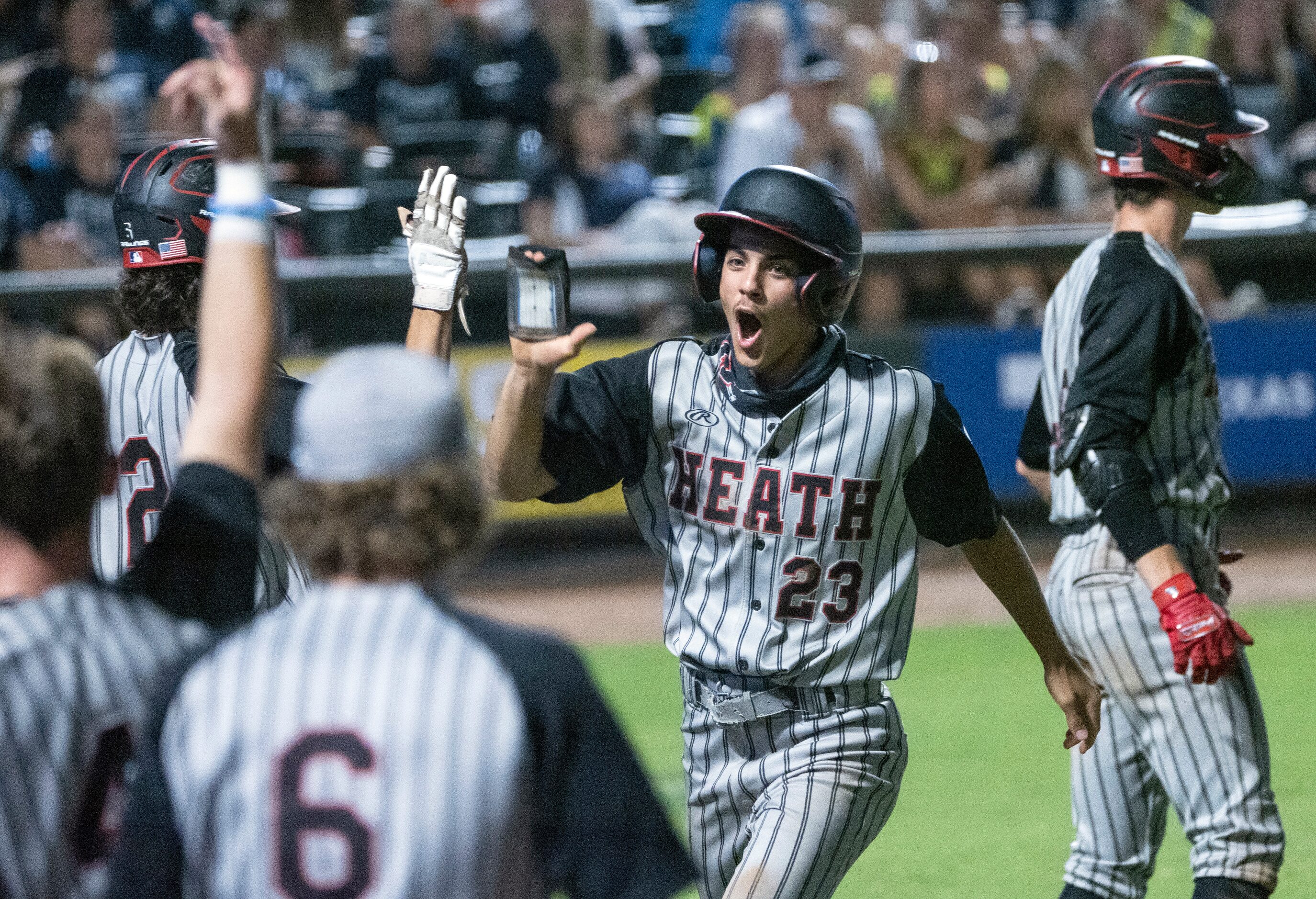 Rockwell-Heath Gage Barkley, (23), celebrates with teammates after scoring against Comal...