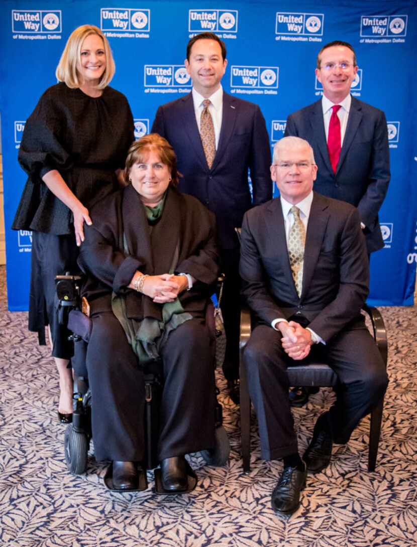 United Way of Metropolitan Dallas officials posed during a recent board meeting and campaign...