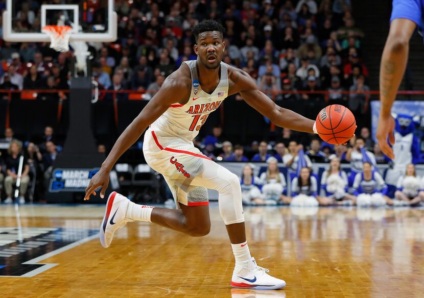 BOISE, ID - MARCH 15:  Deandre Ayton #13 of the Arizona Wildcats handles the ball against...