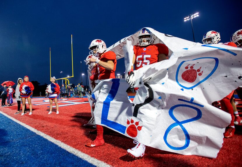 Parish Episcopal sophomore quarterback Preston Stone (2), left, and senior lineman Sam Burns...