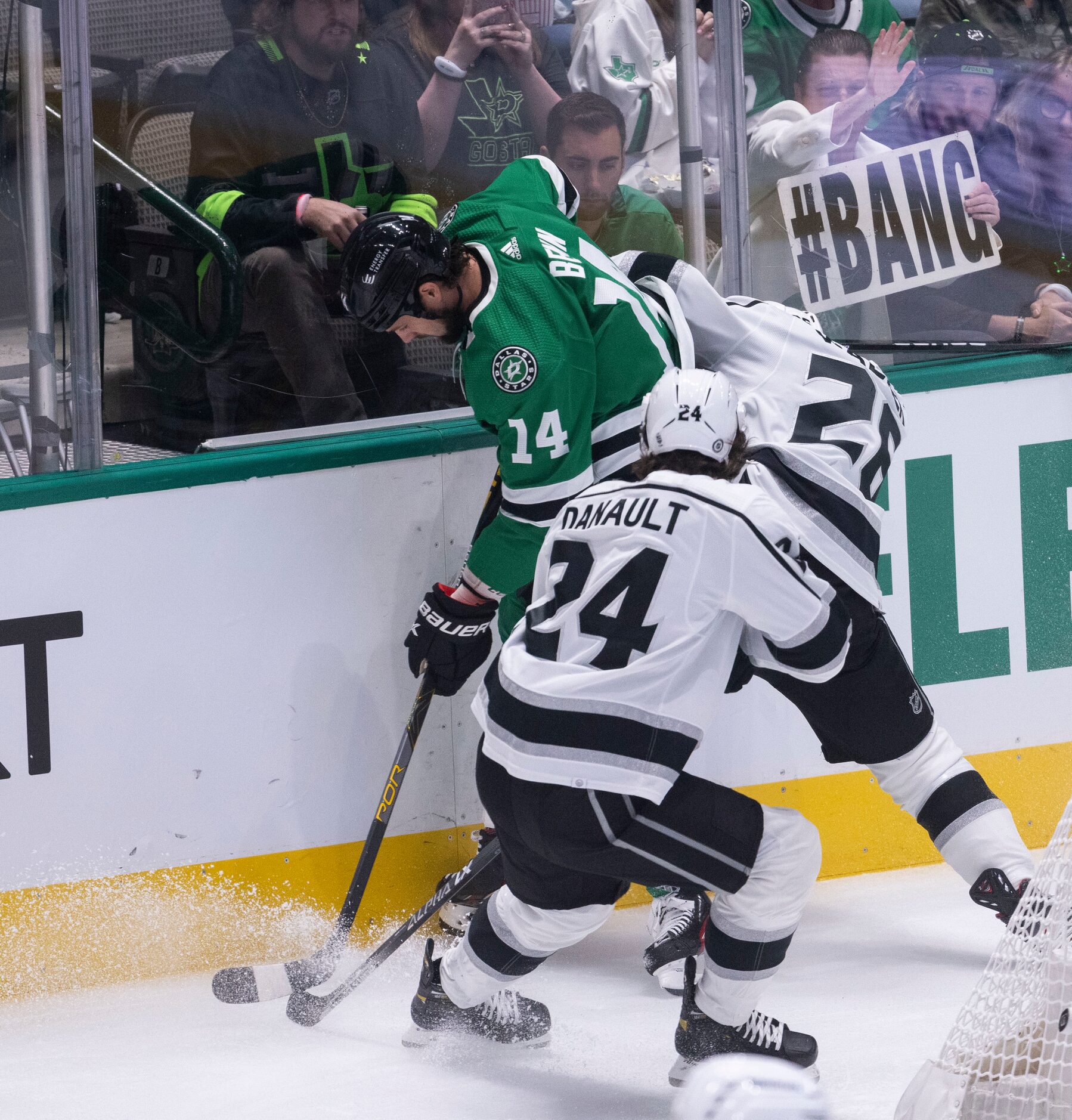 Los Angeles Kings defenseman Sean Walker (26) and Los Angeles Kings left wing Phillip...