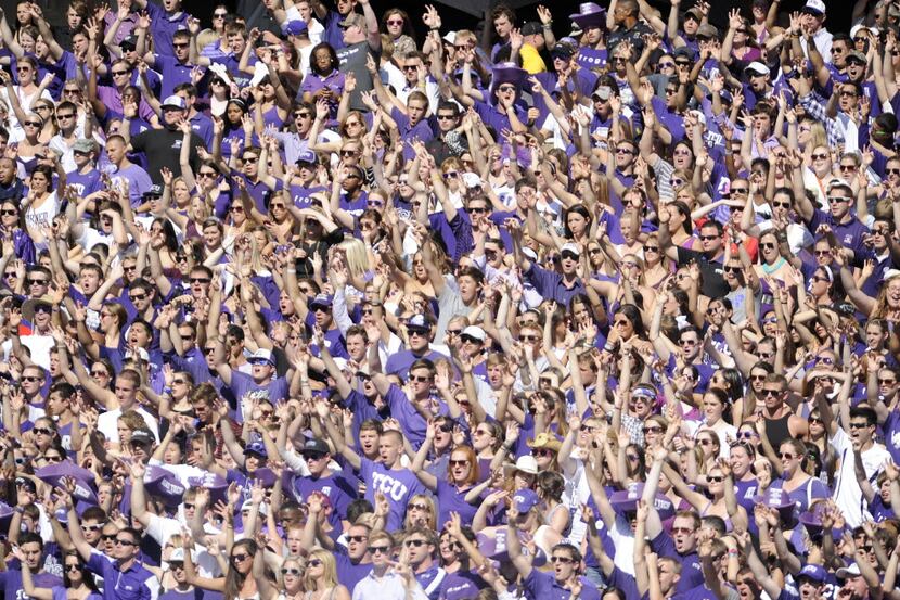 TCU fans cheer in the first quarter during a college football game against Texas Tech,...