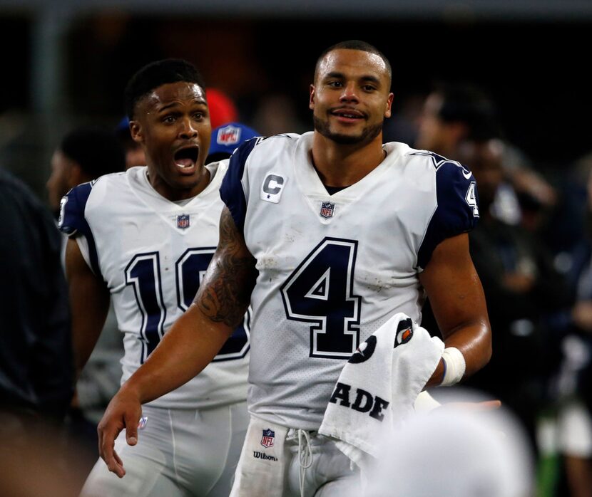 Dallas Cowboys wide receiver Brice Butler (19) and Dallas Cowboys quarterback Dak Prescott...