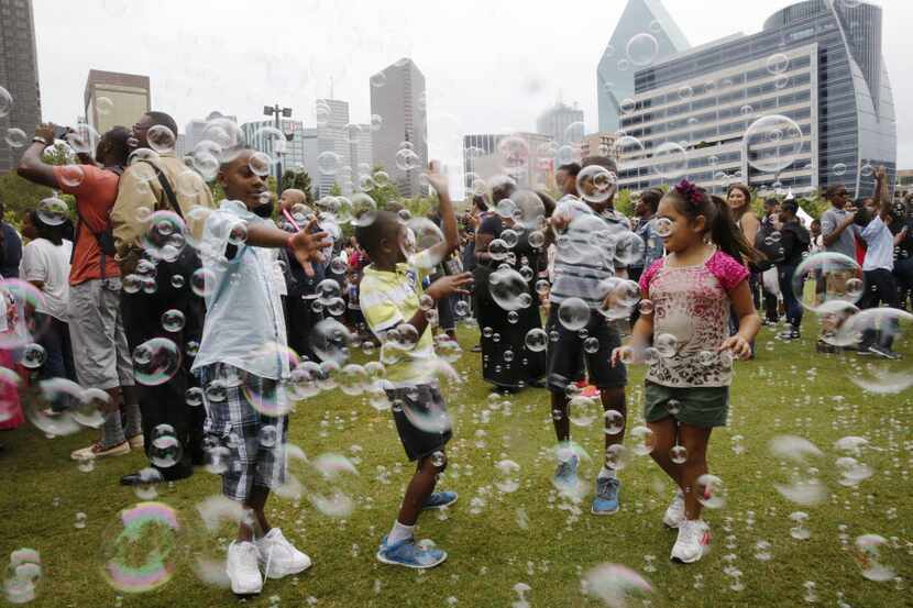 A crowd of bubbles and their fans helped kick off MegaFest in the shadow of the downtown...