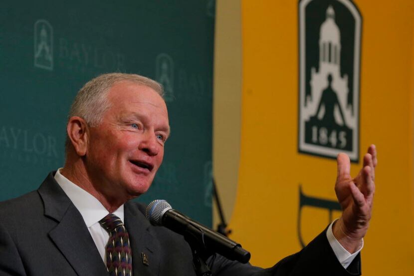 Baylor interim head football coach Jim Grobe talks with reporters during a news conference,...