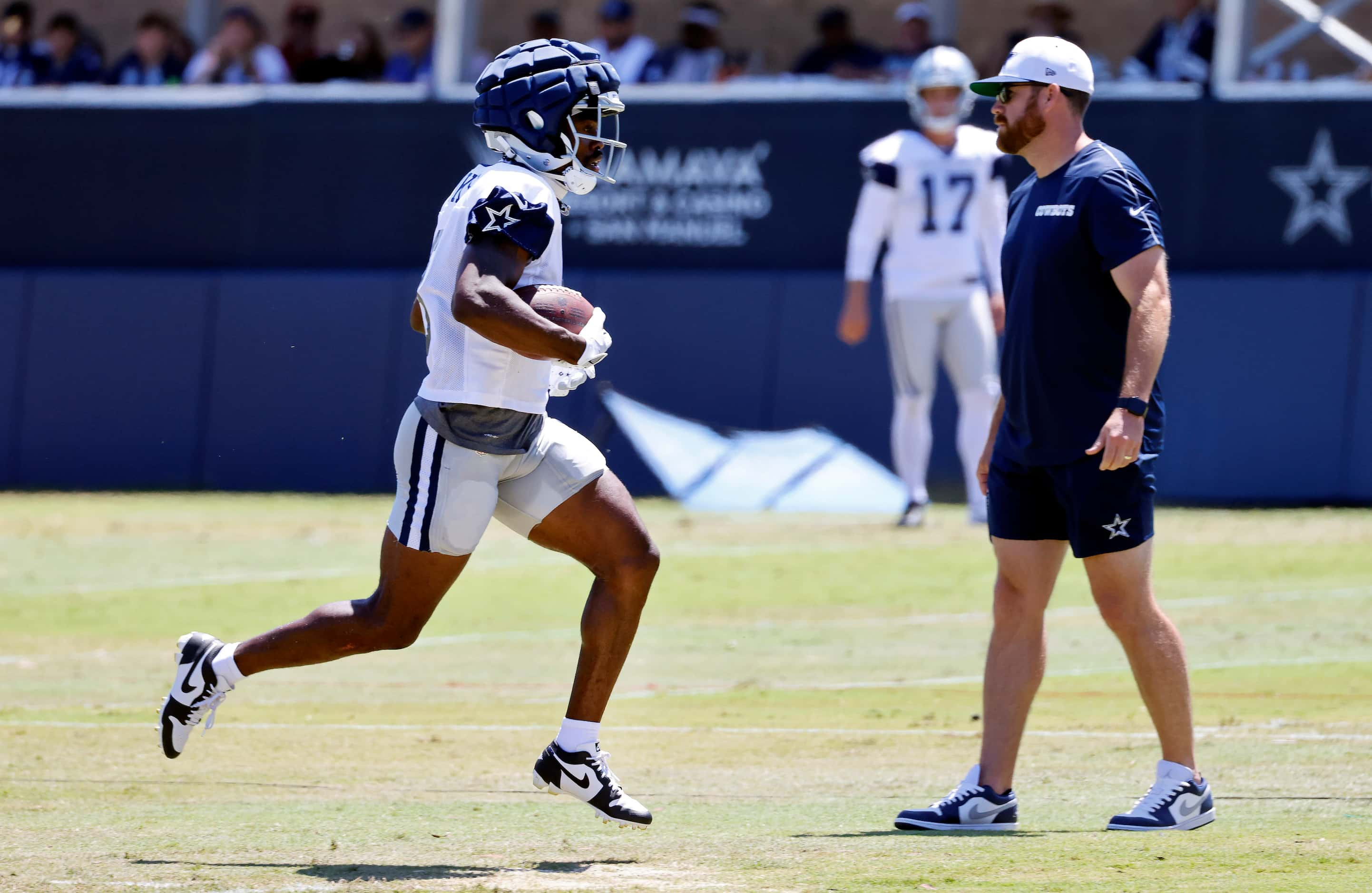 Dallas Cowboys wide receiver Brandin Cooks (3) races for the end zone after pulling in a...