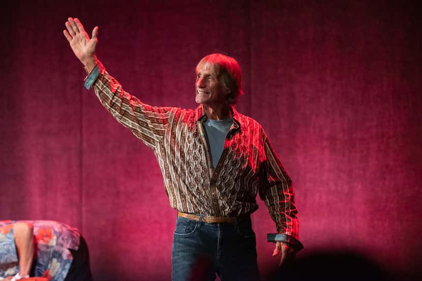 Pro wrestling legend Kevin Von Erich waves and sends kisses to fans as he exits the stage...