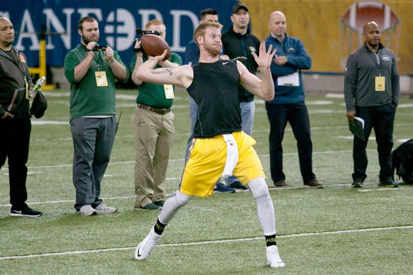 North Dakota State quarterback Carson Wentz throws a pass during the school's NFL football...