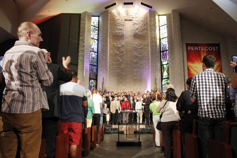 The Turtle Creek Chorale performs a benefit concert for Orlando at the Cathedral of Hope. 