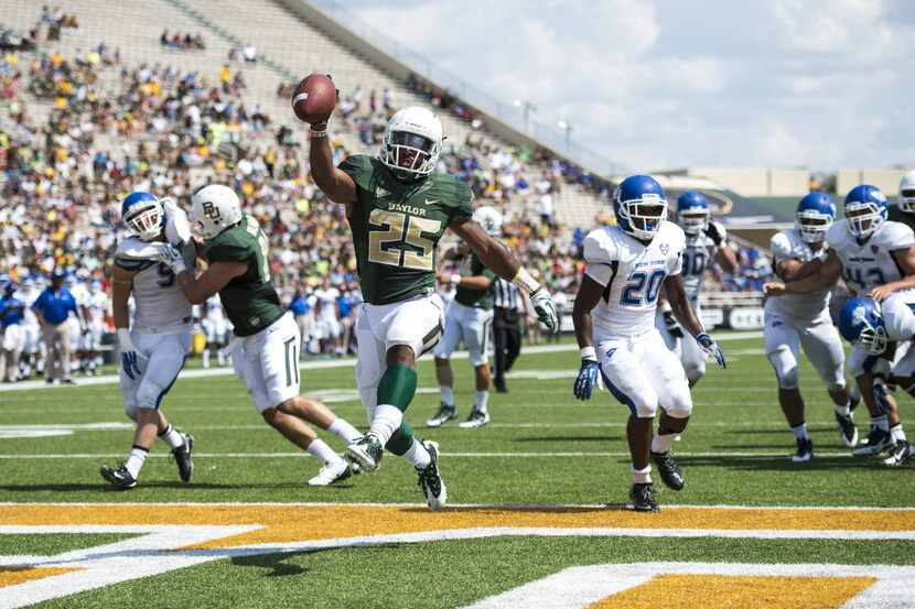 Baylor Bears running back Lache Seastrunk (25) runs for a touchdown during the first half...