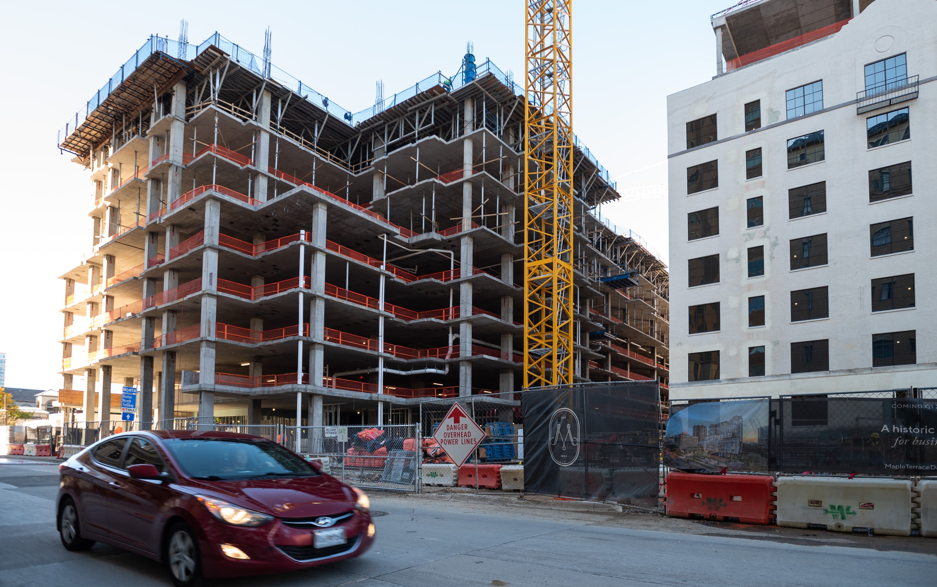 The Maple Terrace residential, left, and office development during construction along Wolf...