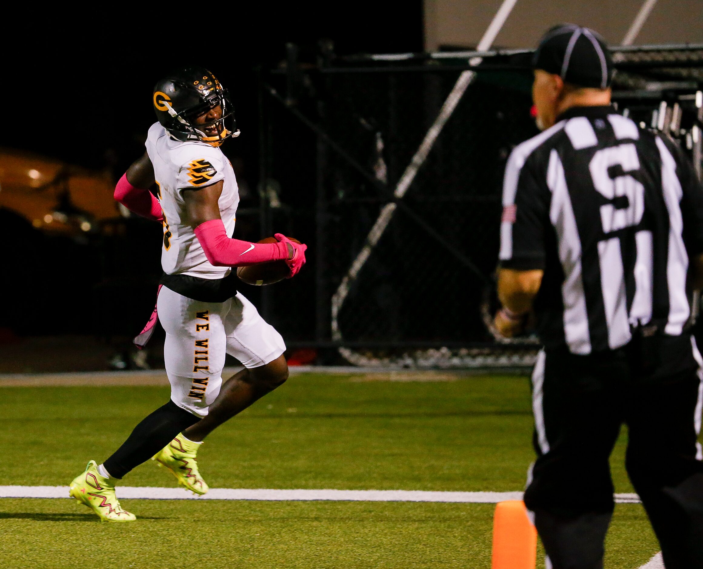 Garlands’s WR Jordan Hudson (5) smiles after scoring a touchdown during the second half of a...