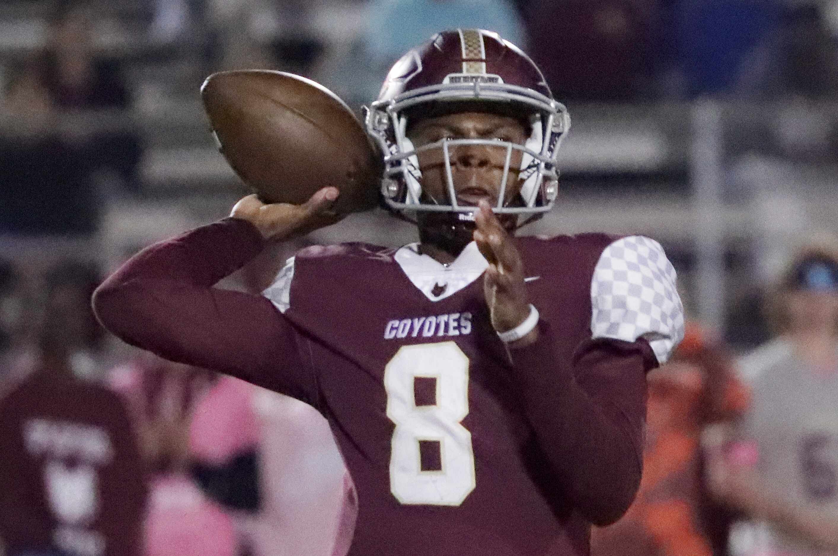 Frisco Heritage High School quarterback Jiyere Cogshell (8) throws a pass during the first...