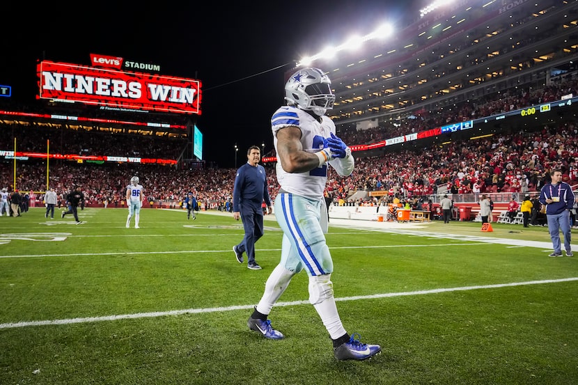 Dallas Cowboys running back Ezekiel Elliott leaves the field after a loss to the San...