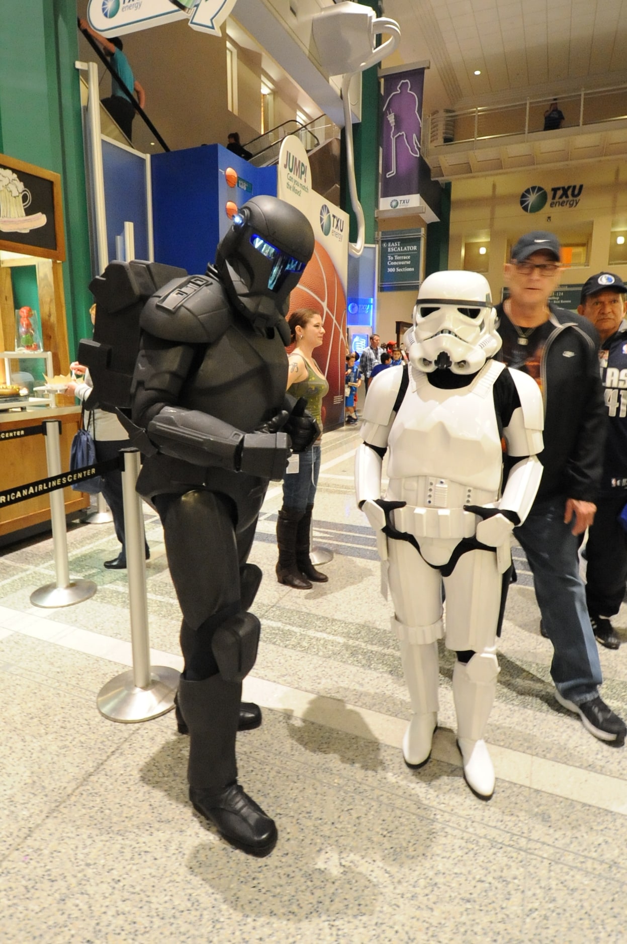 Storm troopers Chris Bradshaw and Sarah Brownlee meet fans at Star Wars night at the Dallas...