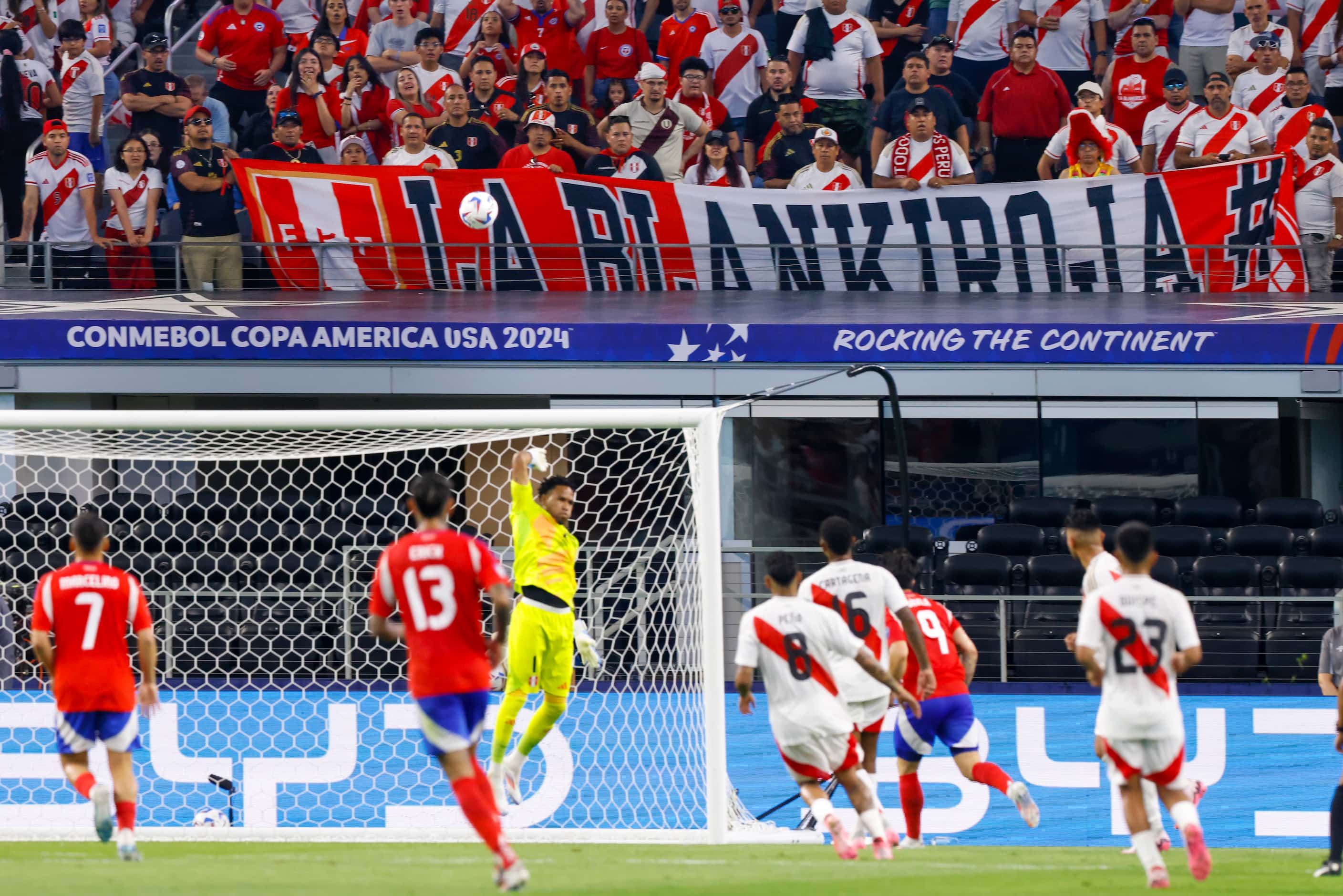Peru soccer fans watch play during the first half of a Copa America Group A soccer match...