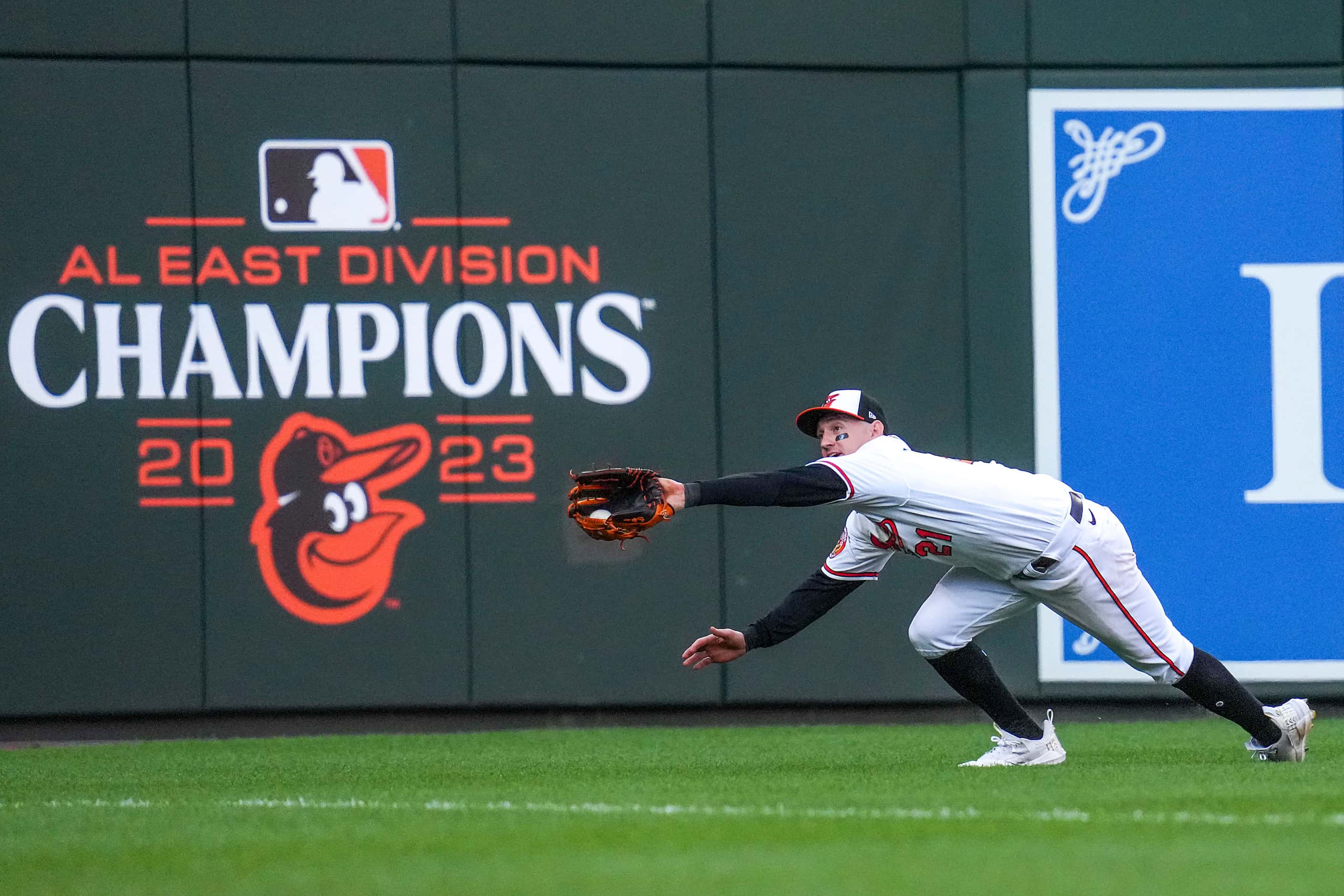 Baltimore Orioles left fielder Austin Hays makes a diving catch on a line drive by Texas...