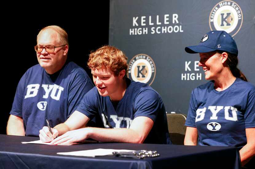 Keller boys basketball player Brooks Bahr sits alongside family during a national letter of...