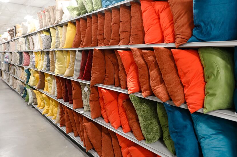 Decorative pillows lined the shelves in At Home, a Plano-based superstore with 226 locations...
