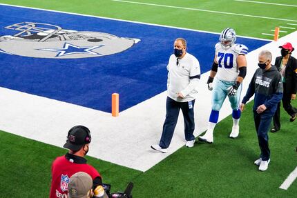 Dallas Cowboys offensive guard Zack Martin (70) head to the locker room during the second...