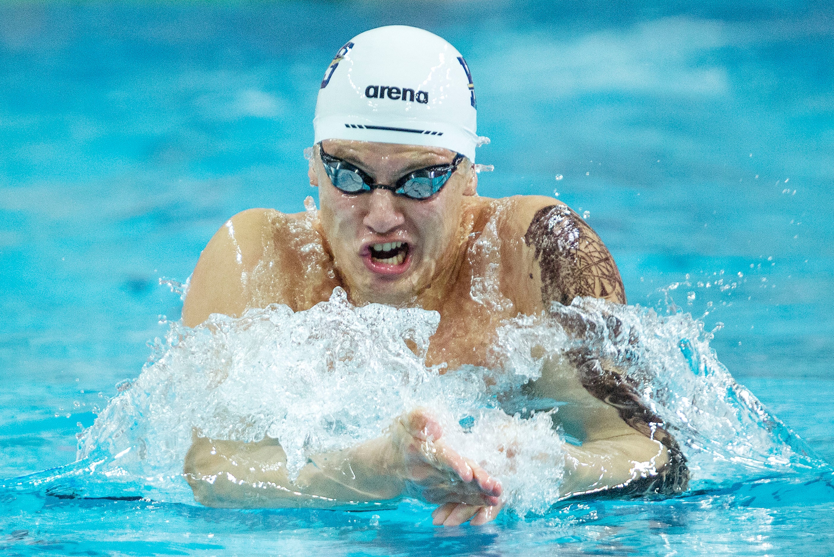 Keller’s Branden Beladi competes in the boys 200-yard medley relay race during the 6A...