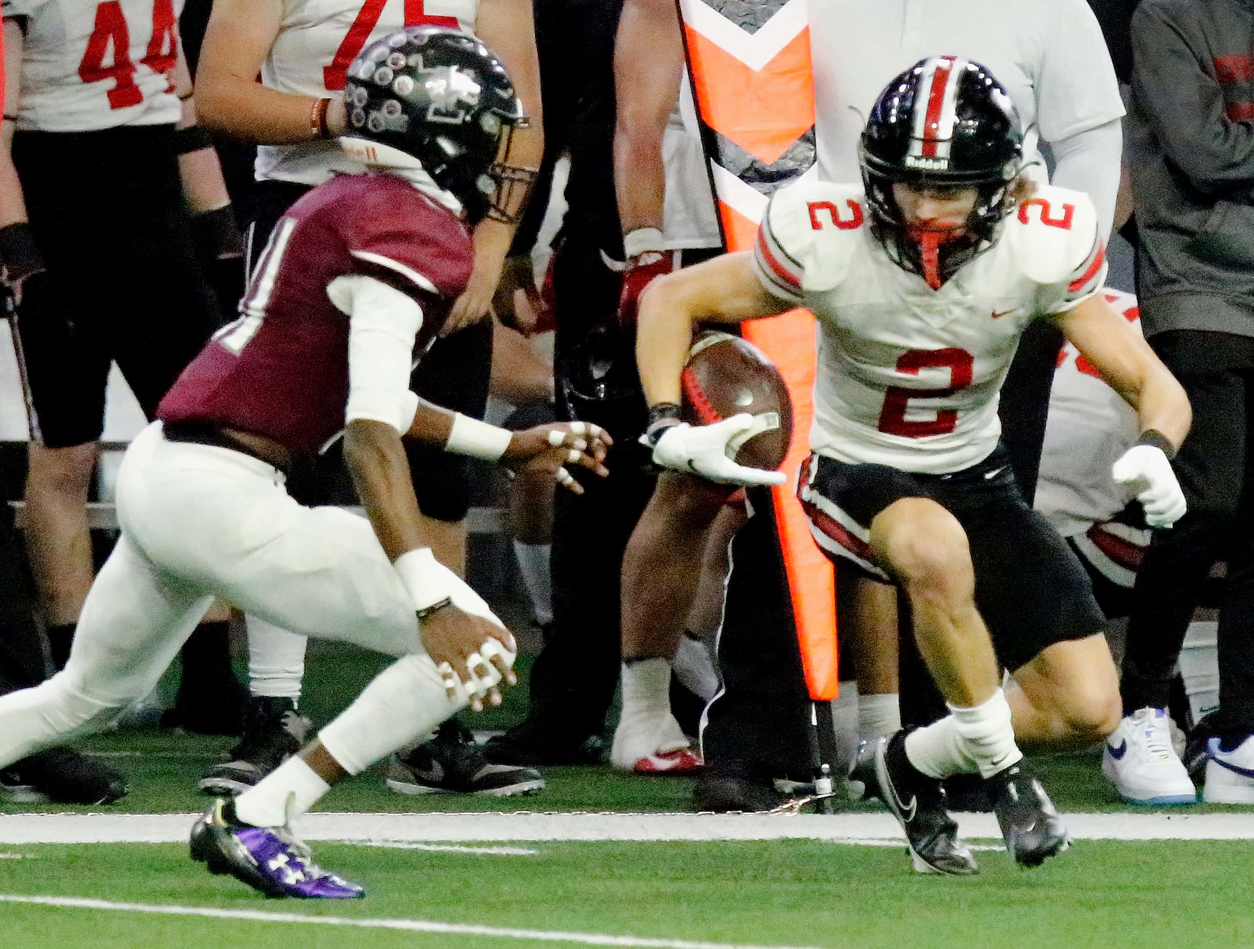 Lovejoy wide receiver Jaxson Lavender (2) looks to run as Mansfield Timberview High School...