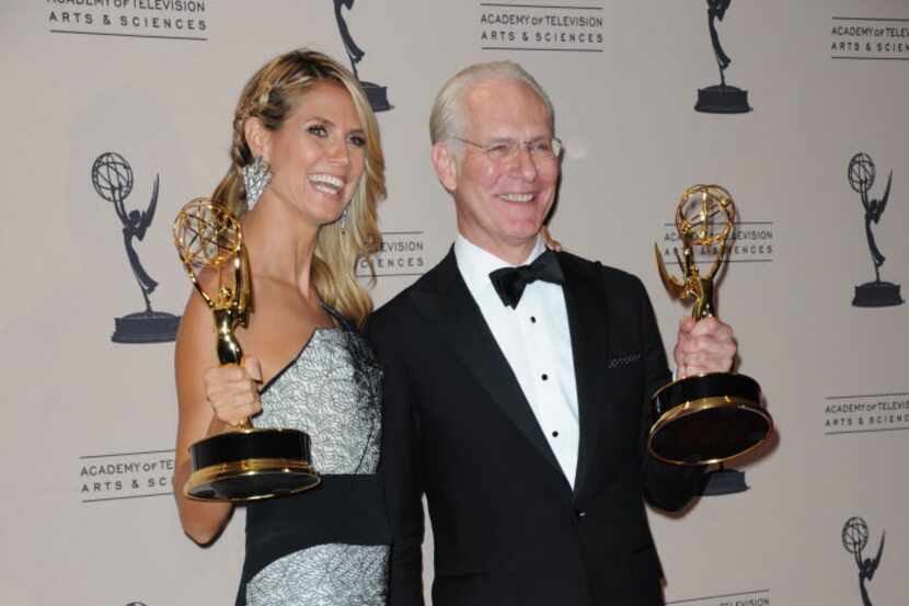Heidi Klum and Tim Gunn posed backstage with the awards for outstanding host for a reality...