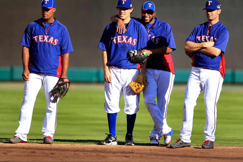 Texas Rangers infielders Adrian Beltre, Elvis Andrus, Ian Kinsler and Michael Young tease...