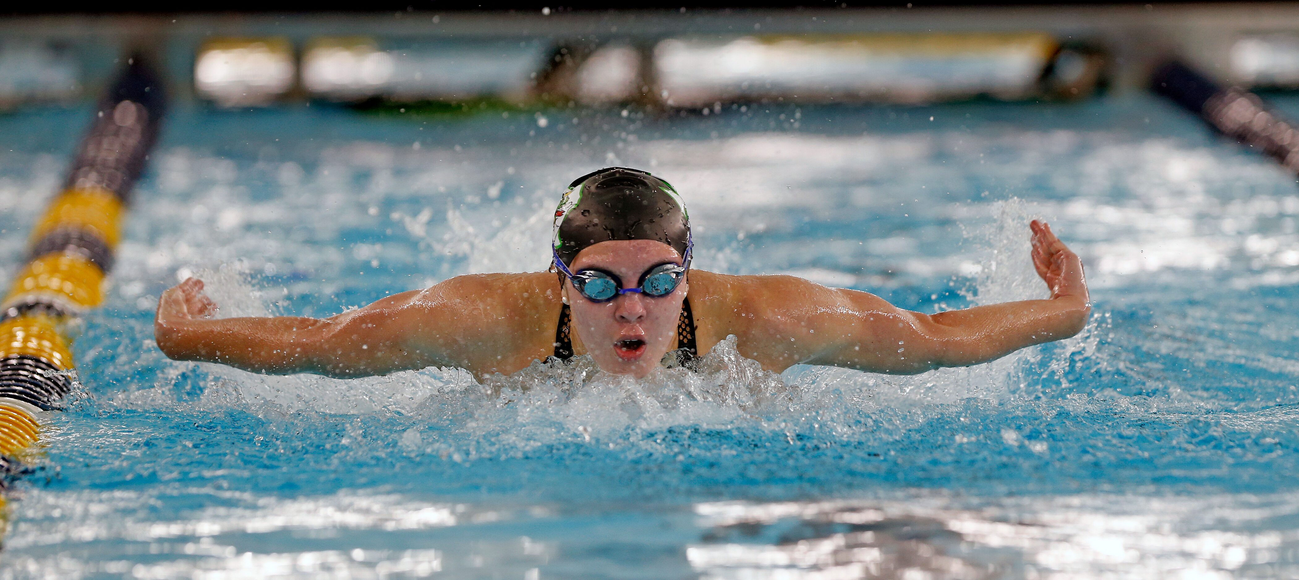 Corbyn Cormack, Southlake Carroll, shows her winning form in 100 yard butterfly in UIL Girls...