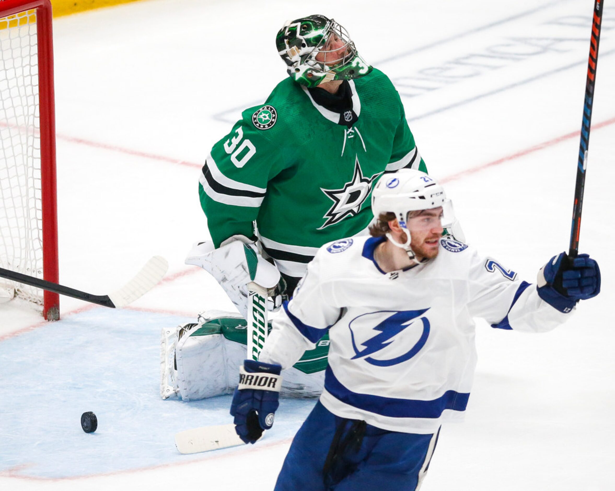 Dallas Stars goaltender Ben Bishop (30) reacts after a score by Tampa Bay Lightning right...