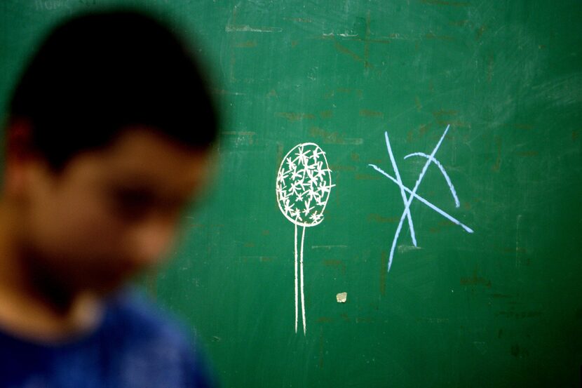 Reunion Tower, a symbol of Dallas and its skyline, is scrawled on a chalkboard at Adamson...