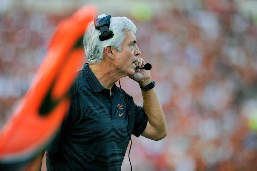 Texas' new defensive coordinator Greg Robinson yells on the sidelines. (AP Photo/The Daily...