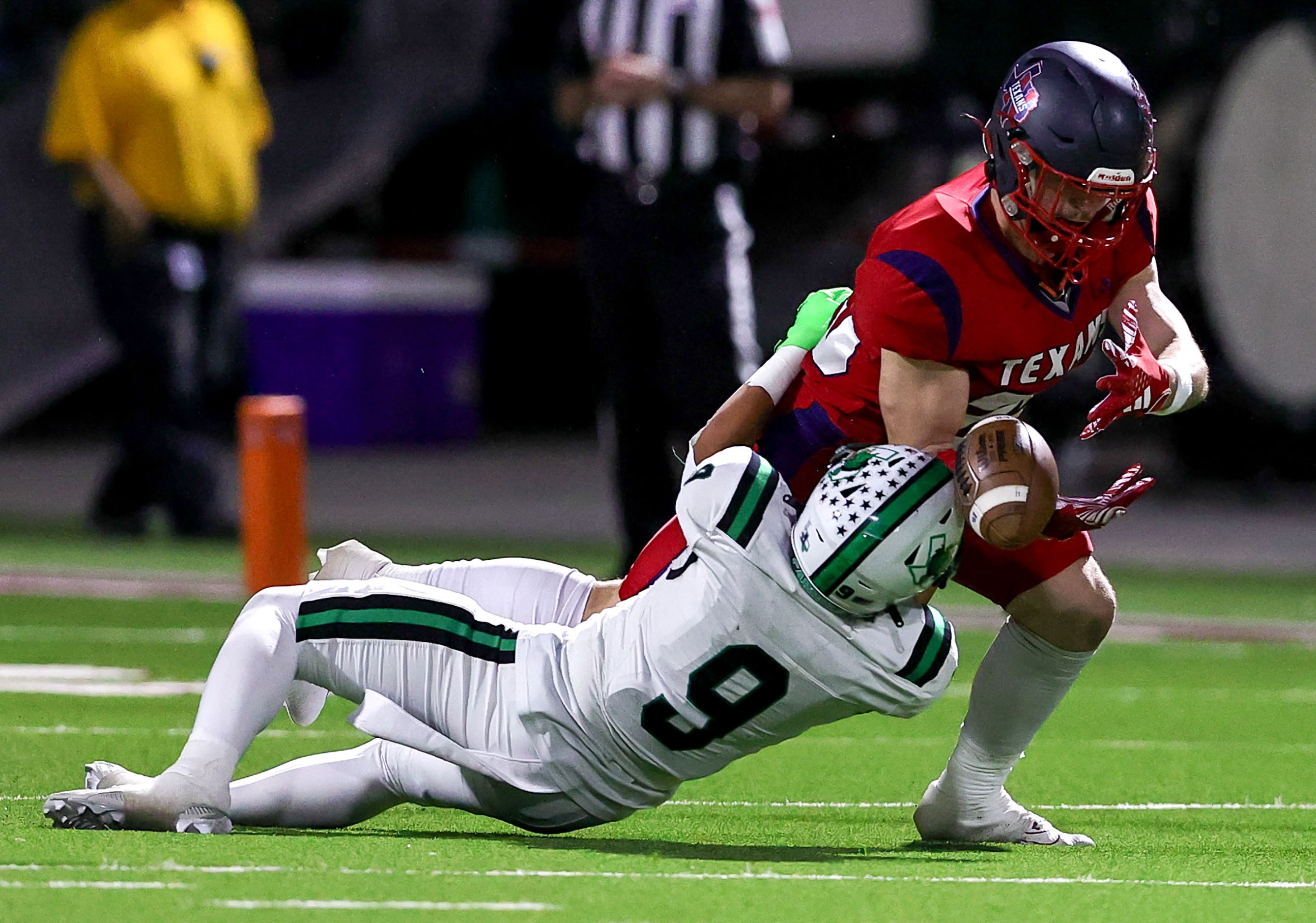 Justin Northwest wide receiver Mason Fritz (R) can't come up with a reception against...