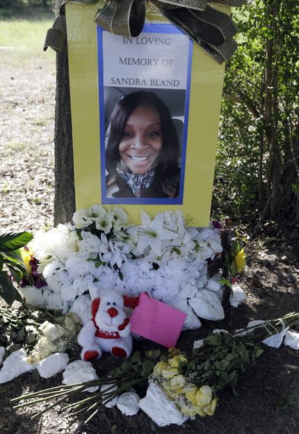 Flowers and other items adorned a memorial for Sandra Bland near Prairie View A&M University...
