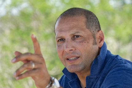 Poncho Nevárez looks out over his property along the Rio Grande in Eagle Pass. 