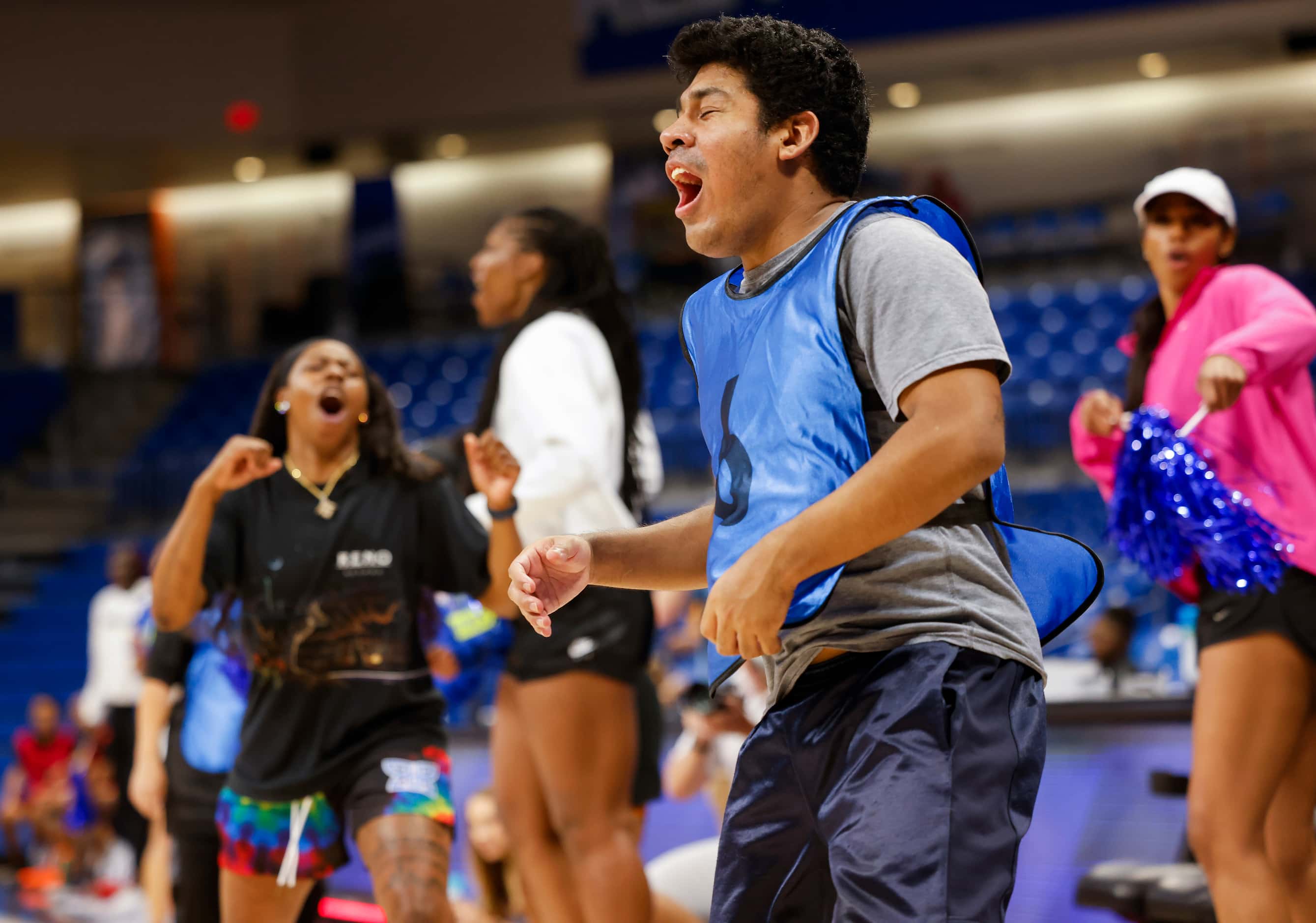 Team Arike’s DJ Harbert (6) reacts to missing a three-pointer against Team Marina during the...