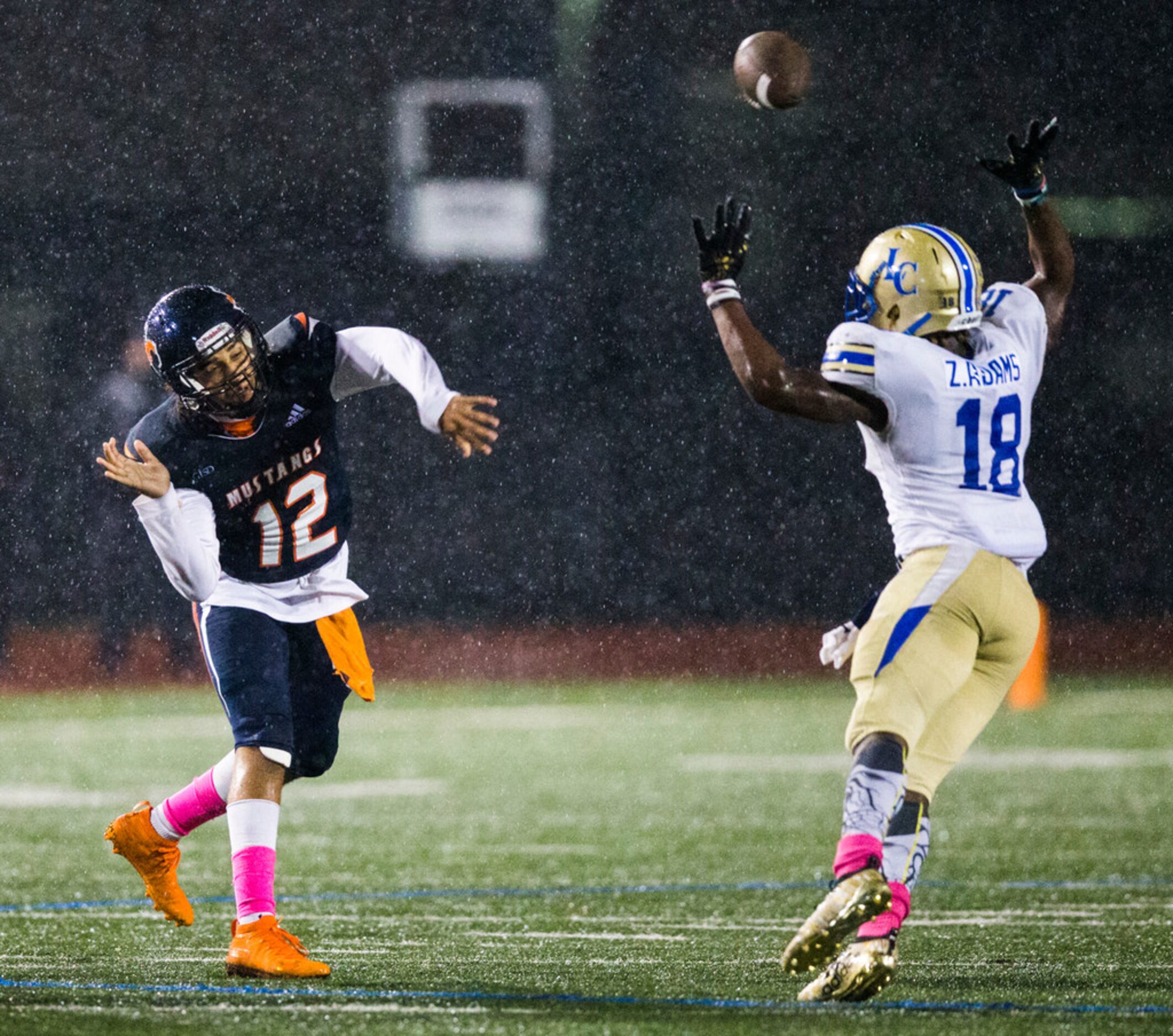 Sachse quarterback Xavier Forman (12) throws a pass over Garland Lakeview linebacker...